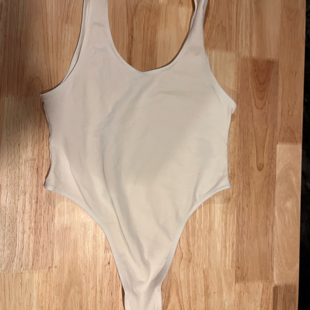 Cream One-Piece Body Suit with high sides